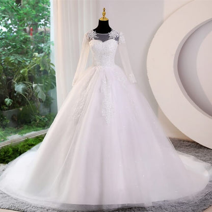 Robe de mariee princesse manche longue